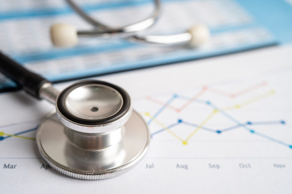 Stethoscope on chart graph for analyzing health